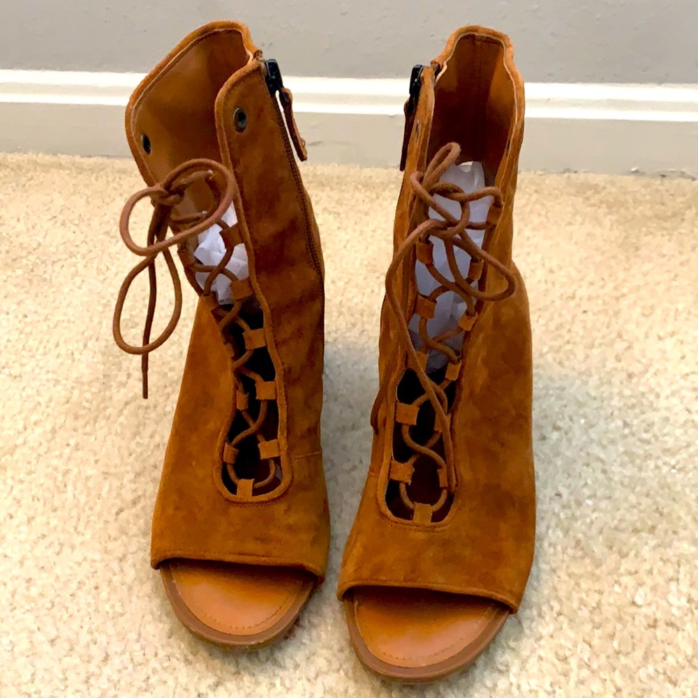 Franco Sarto gently used block heels with a peep toe! Size 8, heel 3inches.